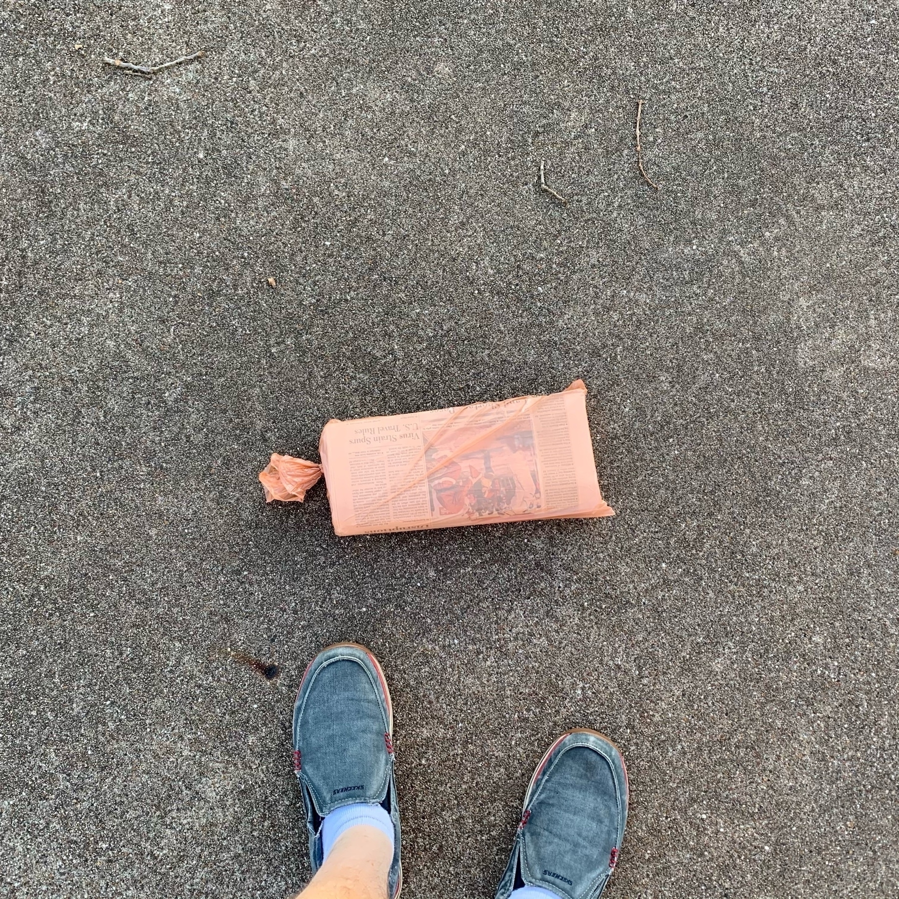 Newspaper delivered in driveway