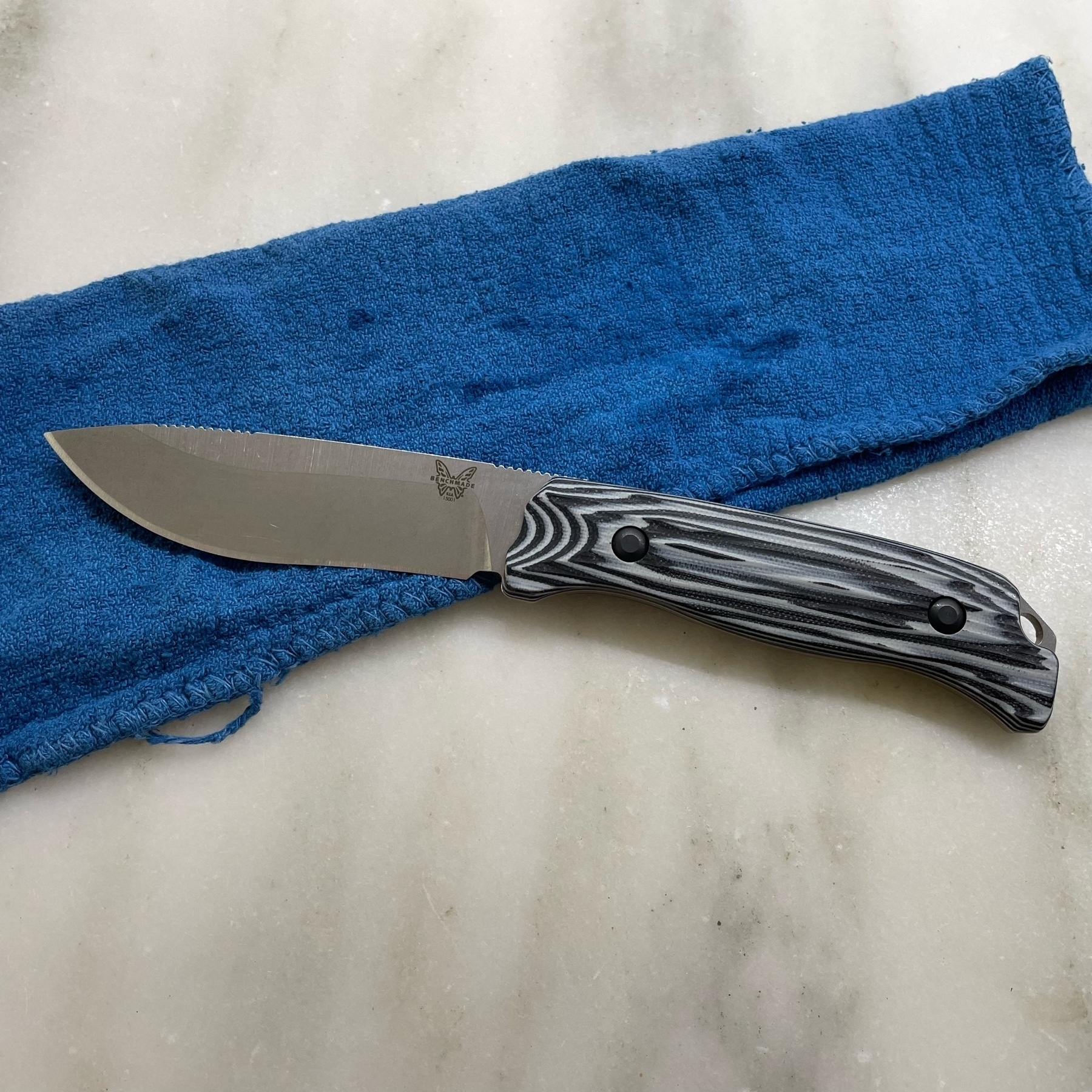 Knife on blue shop cloth
