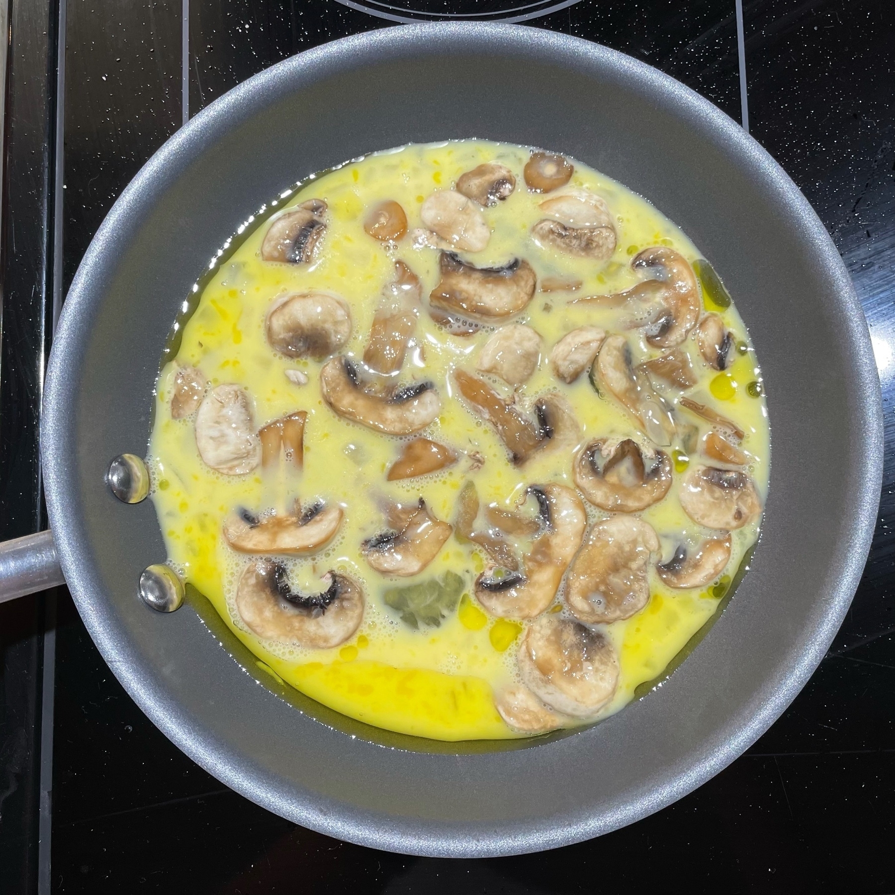 Omelet in frying pan