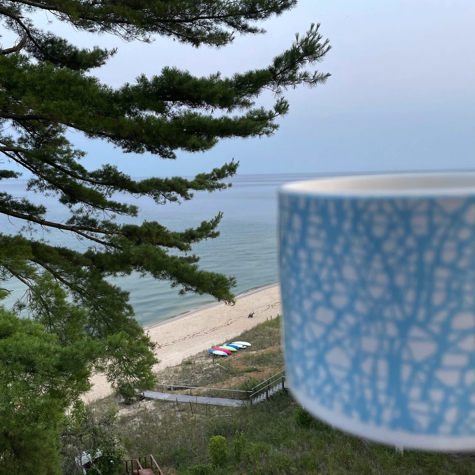 Coffee mug in foreground, Lake Michigan in background