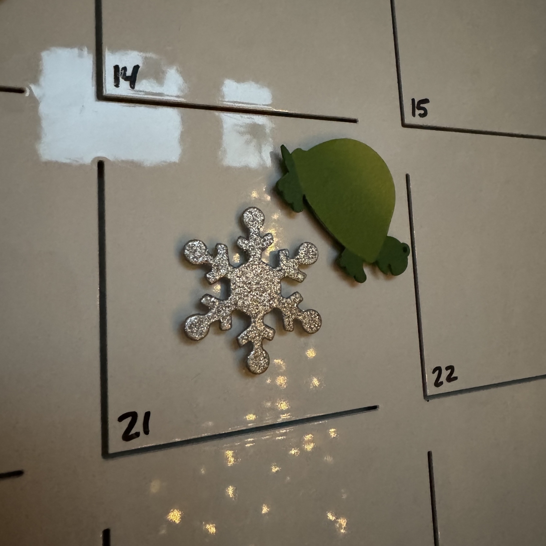 Snowflake magnet on calendar