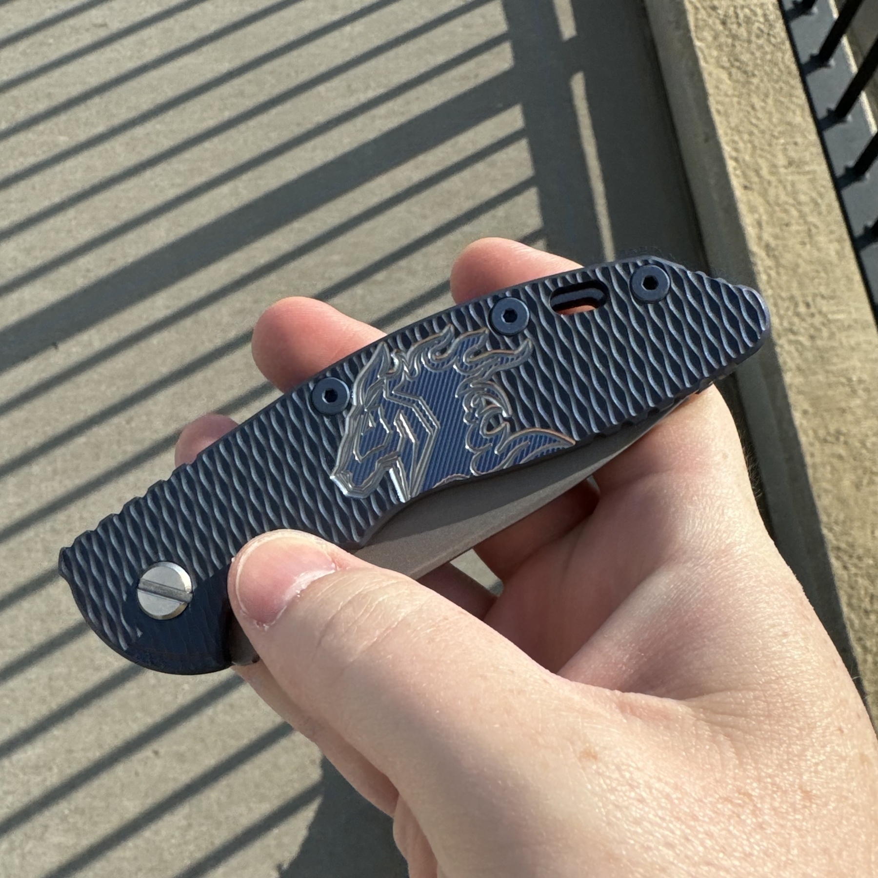 Hinderer XM-18 3.5 with horsehead titanium scale