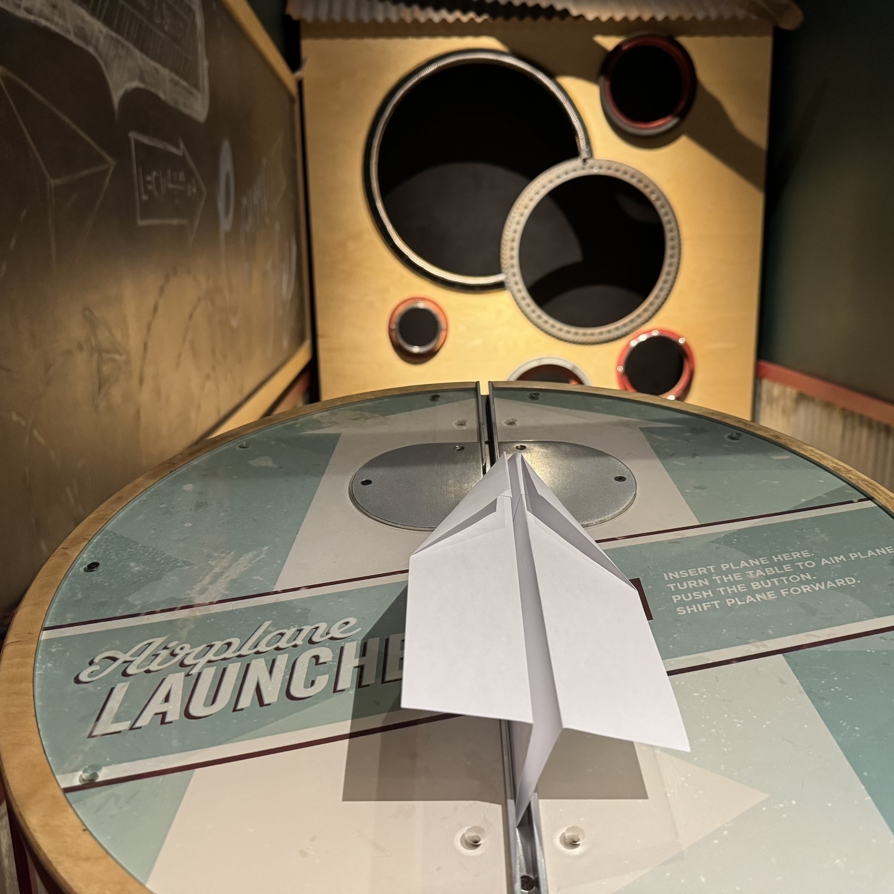 Paper airplane in a launcher