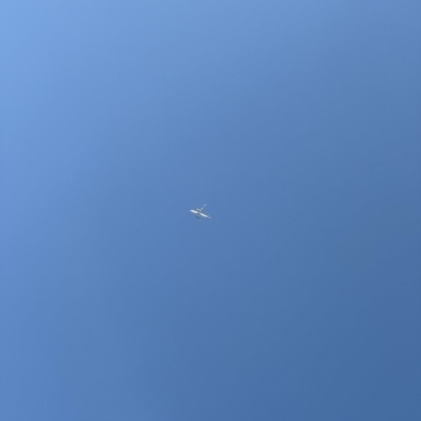 Airplane flying high above