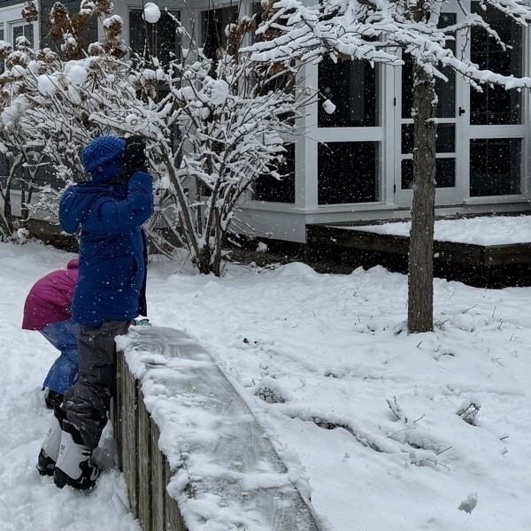 Kids playing in fresh snow