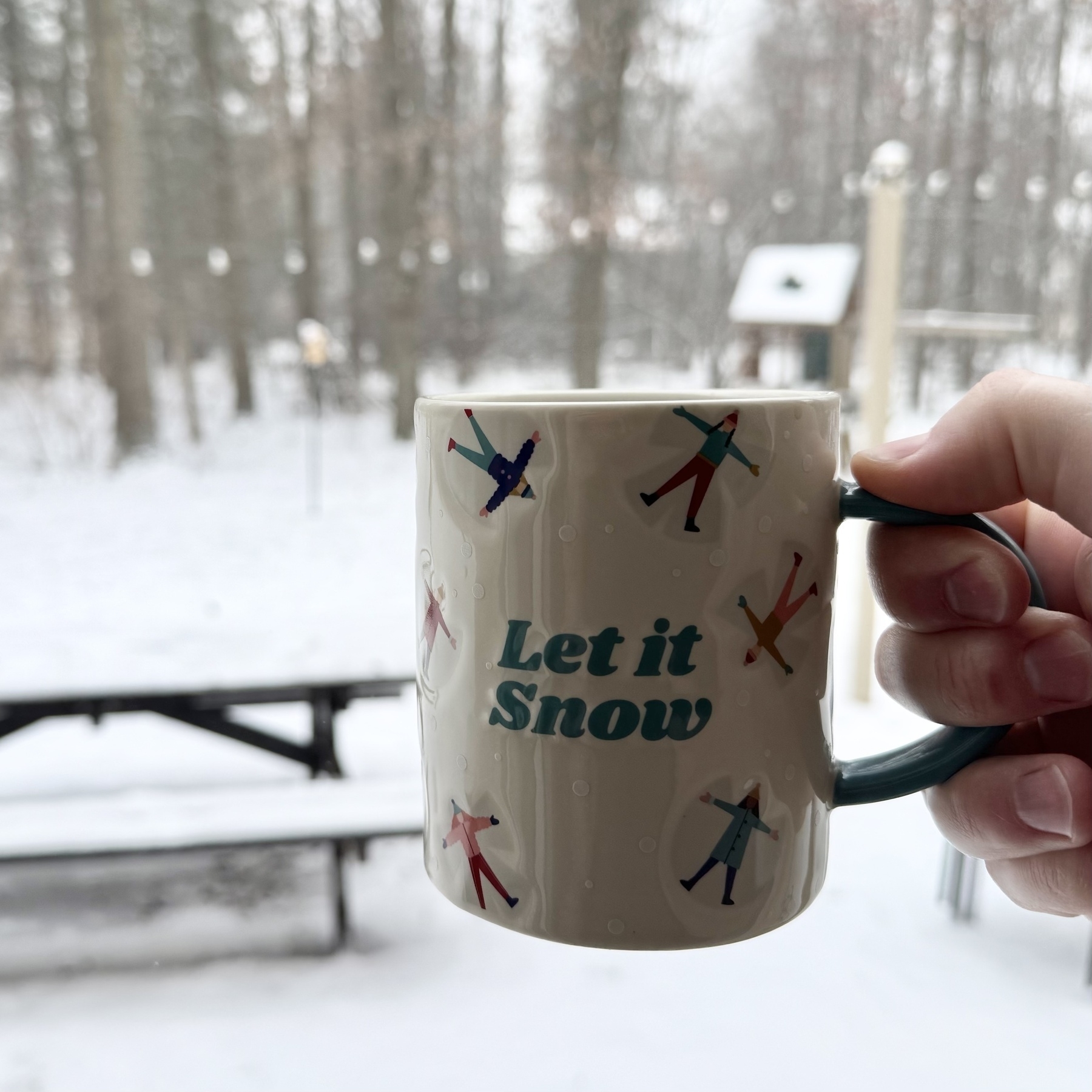 Coffee mug and snow