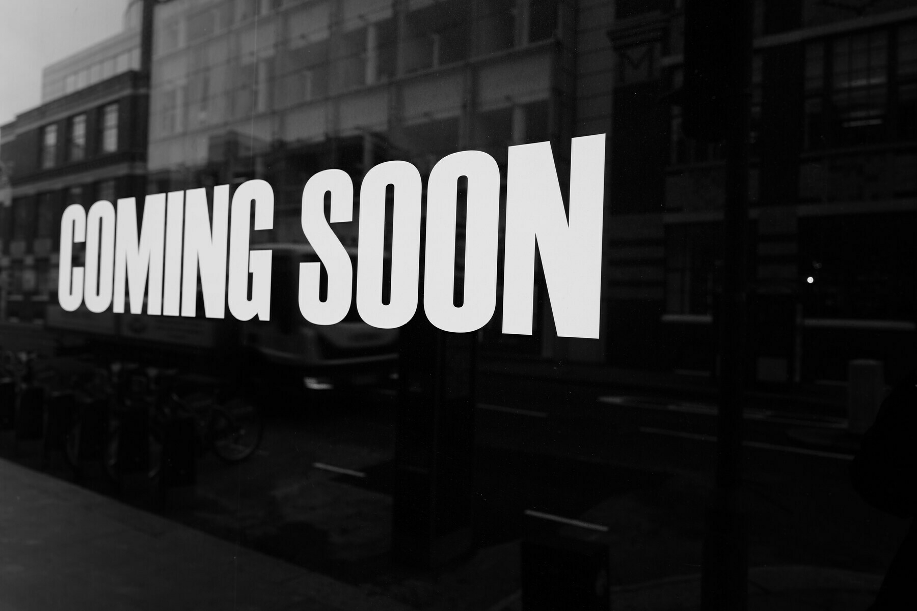 black and white photo that reads: coming soon