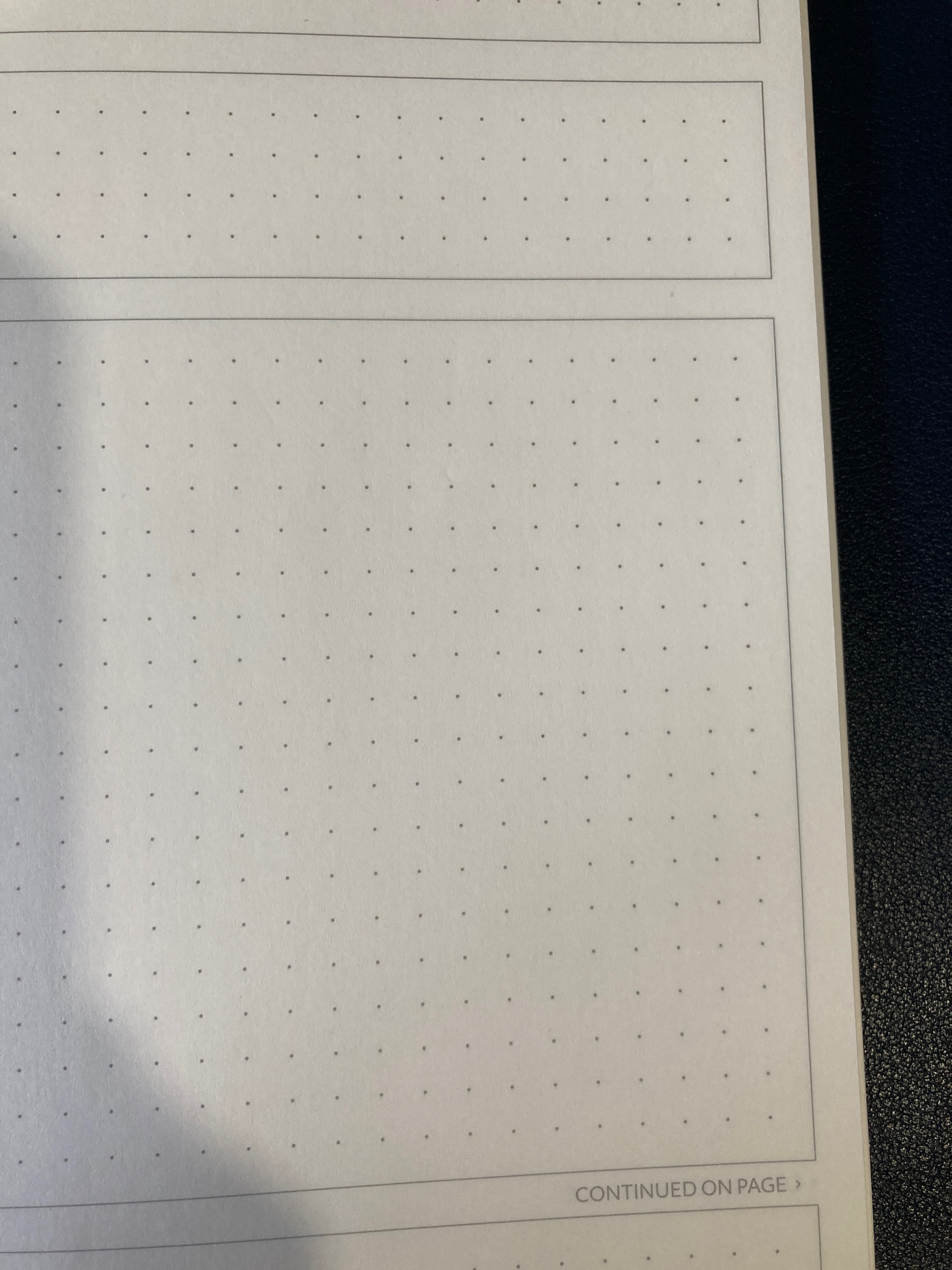 The empty page of a notebook, the “Theme System journal”