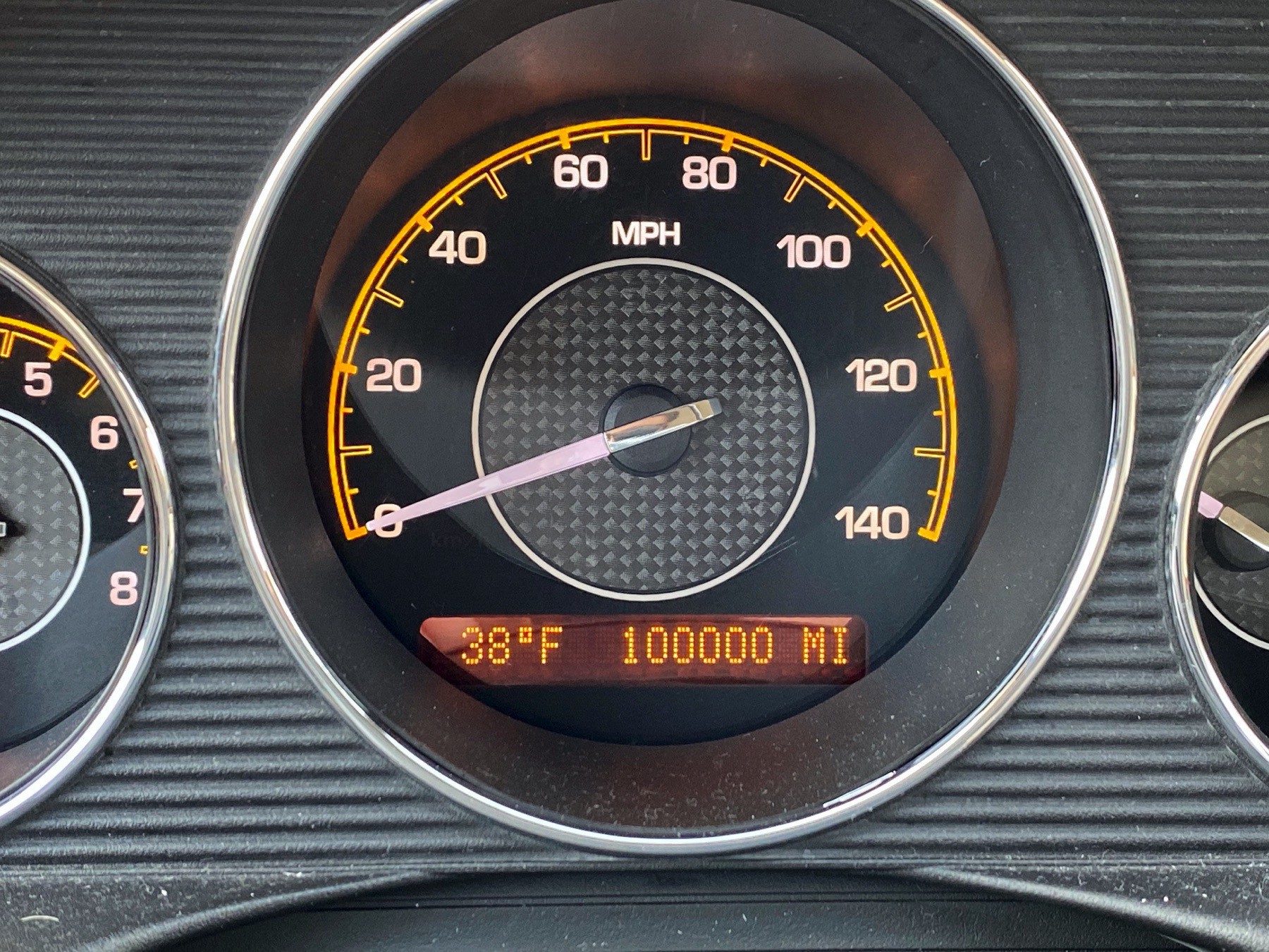 Car Odometer showing 100,000 miles