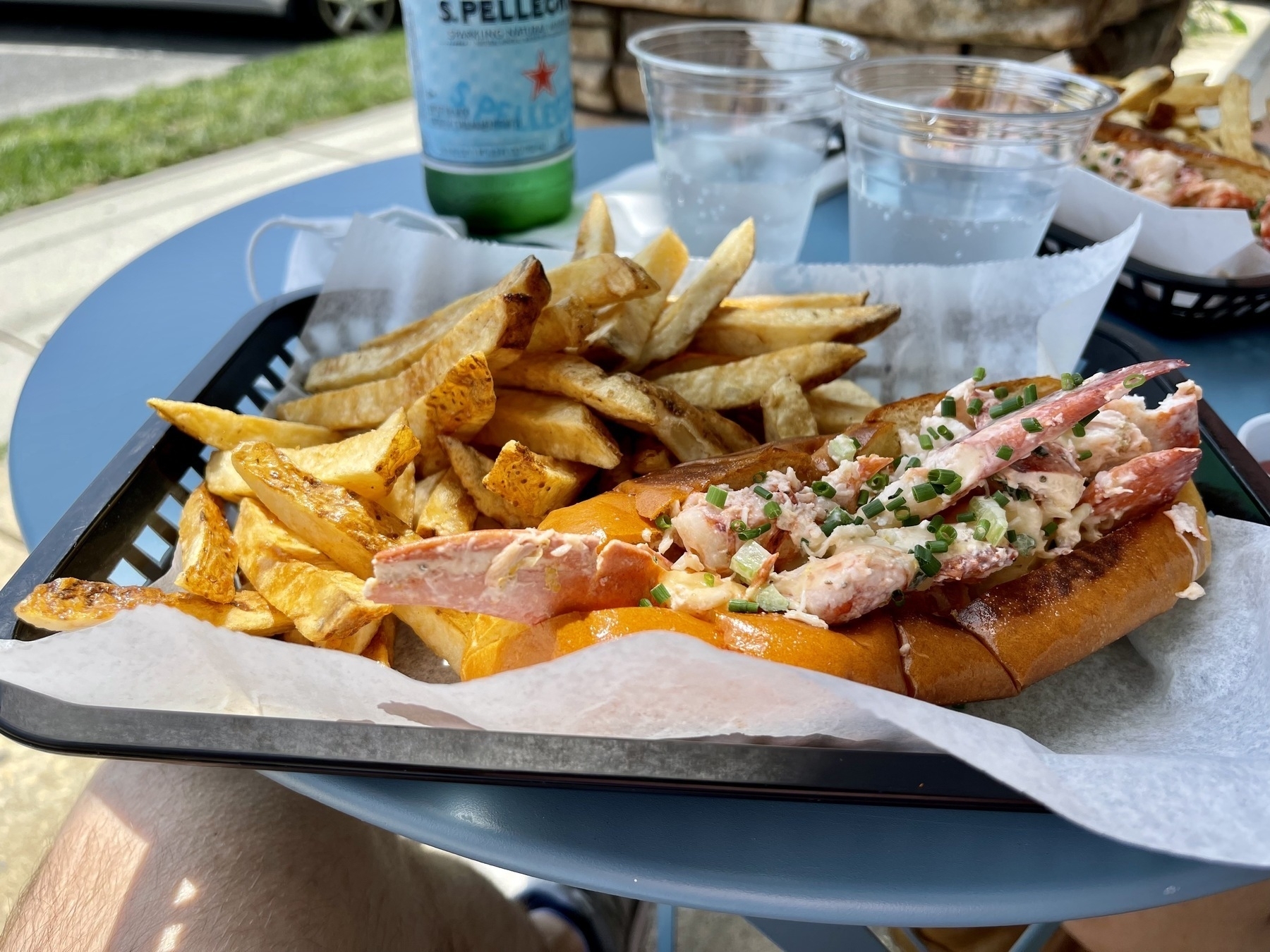 Lobster roll sandwich and french fries