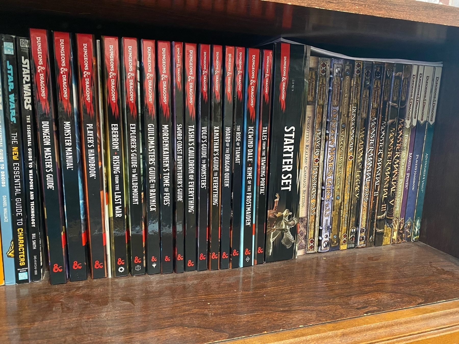 a bookshelf full of D&D handbooks