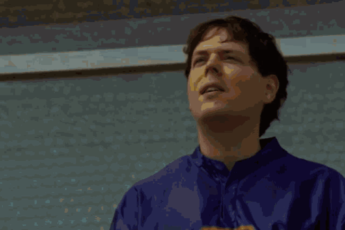 GIF of the fictional TV show Ow! My Balls! From the movie Idiocracy
