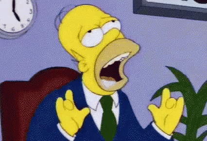 GIF of Homer Simpson in a blue tuxedo, drooling. Presumably thinking about donuts with pink icing. 