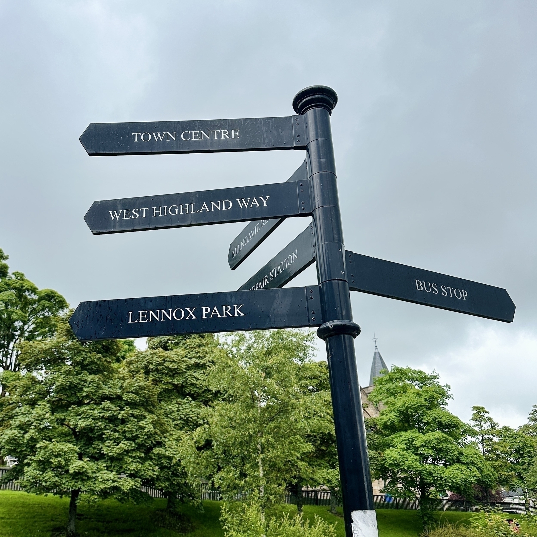 A signpost with directions to the start of the West Highland Way.