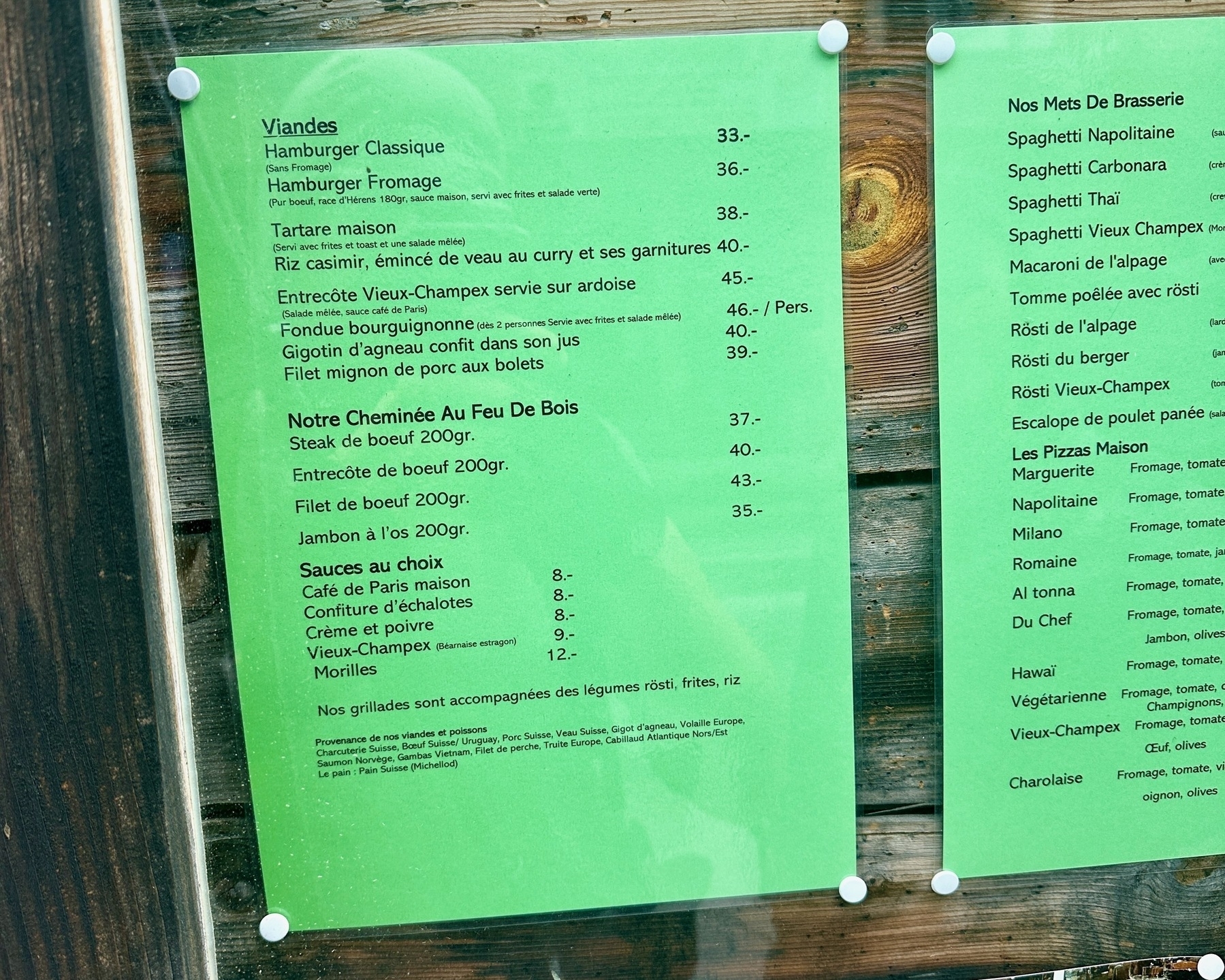a menu of a Swiss restaurant in Champax-Lac with a cheeseburger for CHF 36 which is about £30, twice the price that I'd pay for one at home
