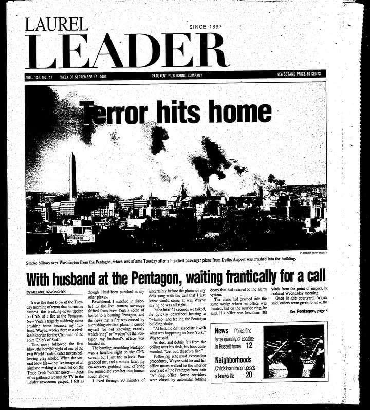 Auto-generated description: A newspaper front page shows a headline about an attack on the Pentagon with an image of smoke billowing over Washington.