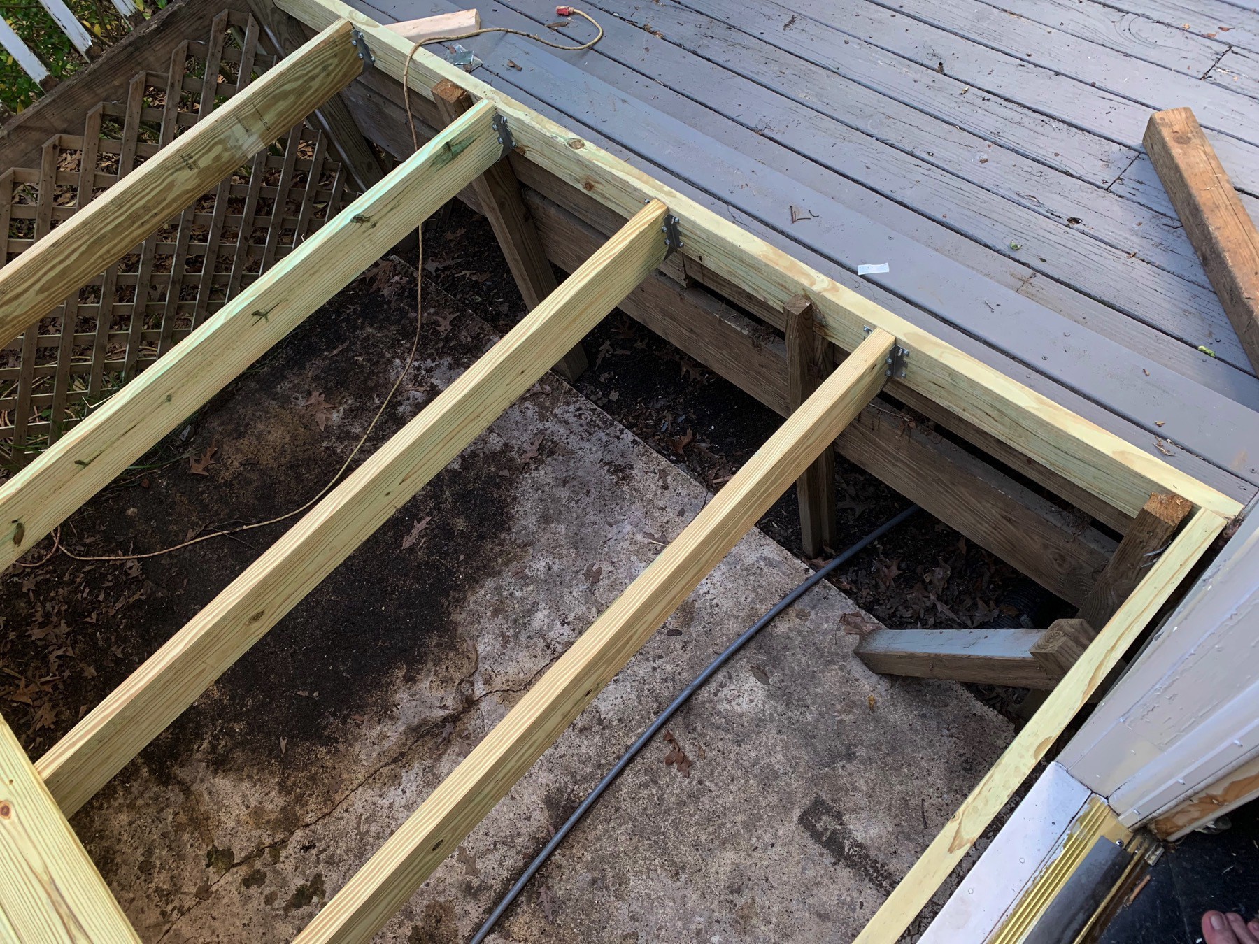 another look from a different angle at the new sleeves, joists, and deck planks we installed