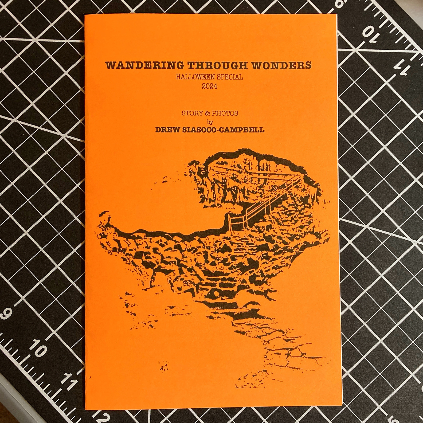 Halloween zine with an orange cover