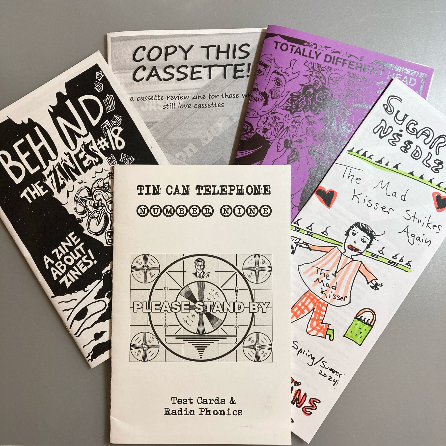 5 zines with creative covers