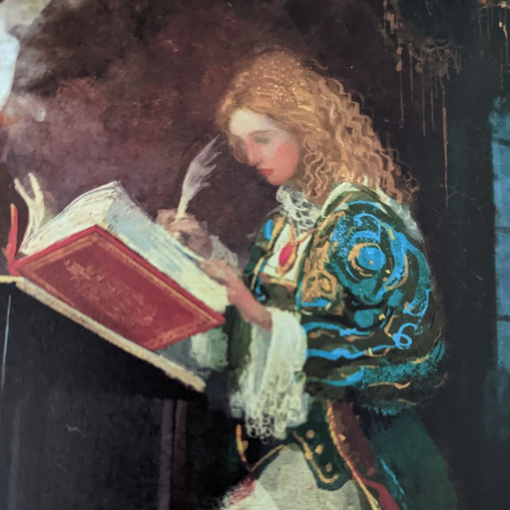 A white person with long curly, blonde hair sits in front of a red book, holding a quill pen.
