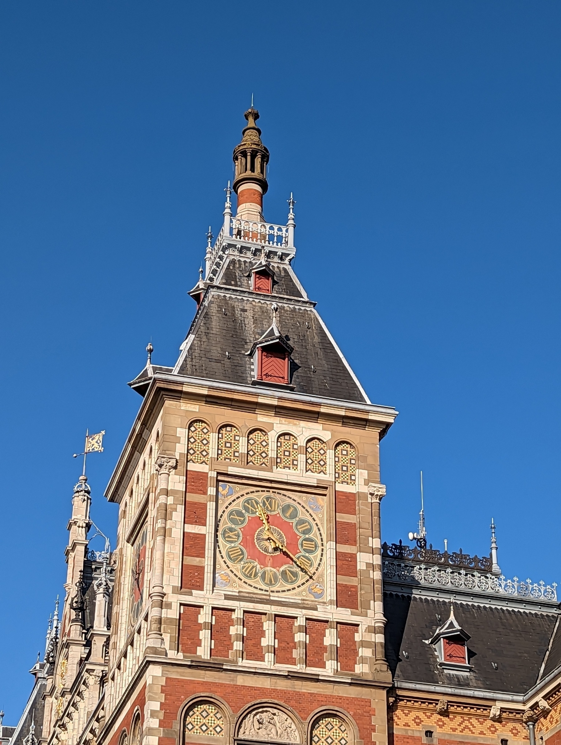 The clock tower at Amsterdam Centraal Station.