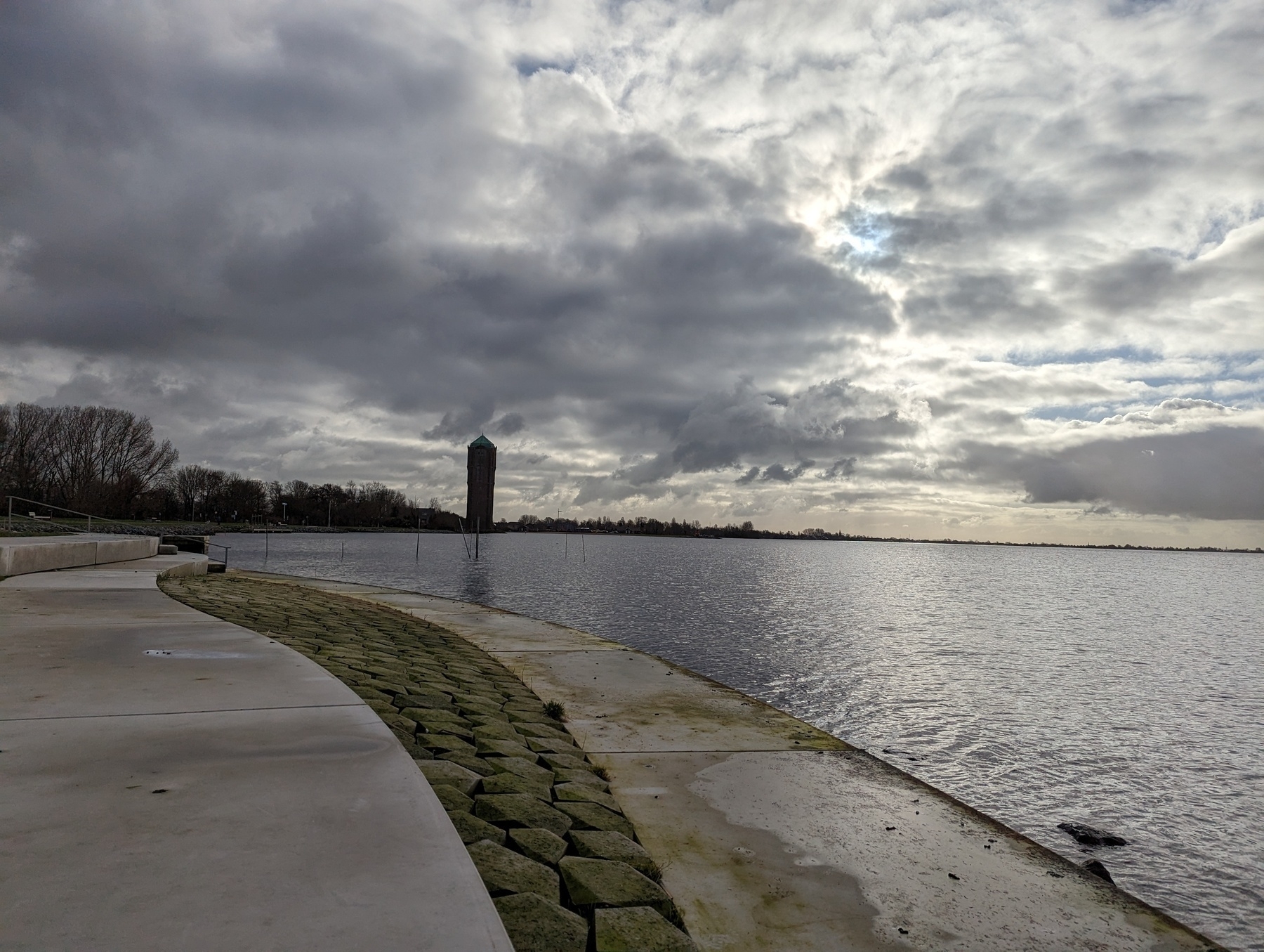 A concrete viewing area at the Westeindeplassen lake, with the watertoren - water tower - in the distance.