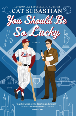 The cover of the book ‘You Should Be So Lucky’ by Cat Sebastian features two illustrated characters against a blue background. On the left, a character wears a red and white baseball uniform with the team name ‘Robins’ across the chest, holding a baseball bat over one shoulder. On the right stands another character in brown period clothing, holding an open book in one hand and a microphone in the other. Behind them are line drawings that include baseball paraphernalia, architectural elements like columns and arches, and what appears to be the Statue of Liberty’s torch. At the bottom of the image is praise for Cat Sebastian from Olivia Waite, stating, ‘Cat Sebastian is my desert island author.’