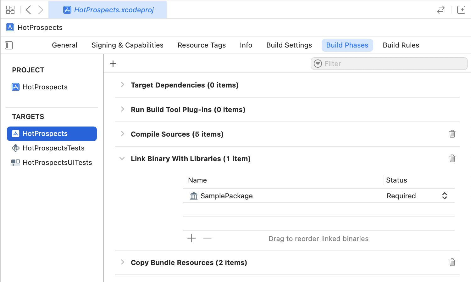 The Xcode Build Phases screen is open for the HotProspects project. It lists project phases like Target Dependencies, Compile Sources with five items, and Link Binary With Libraries, which includes a single required package named SamplePackage.