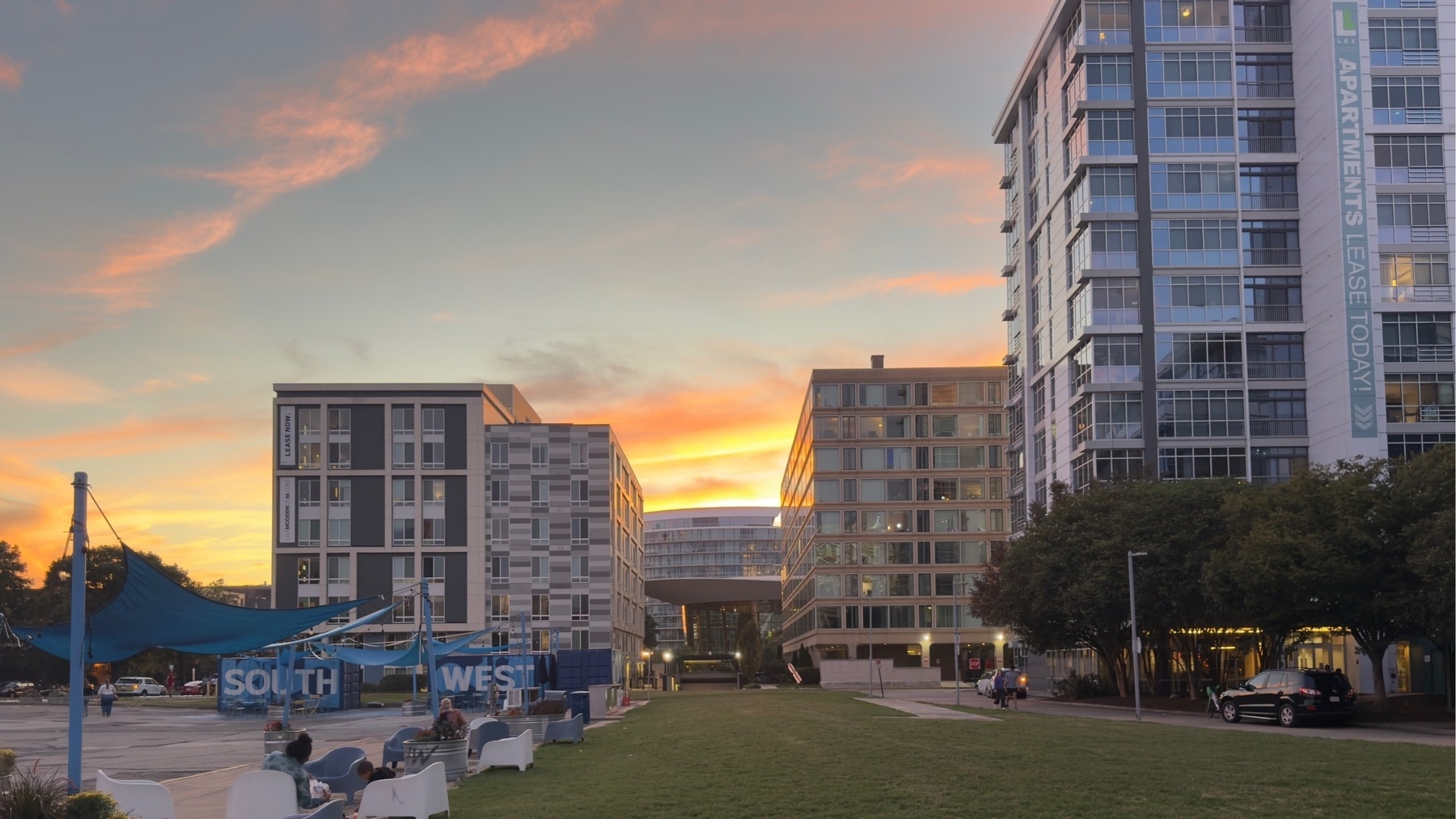 Sunset over apartment building near the DC Wharf