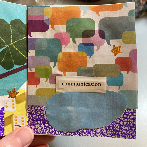 A hand holds a collage zine that features colorful speech bubbles, a blue oval shape with purple doodles around it, and a yellow star. The text says, communication.