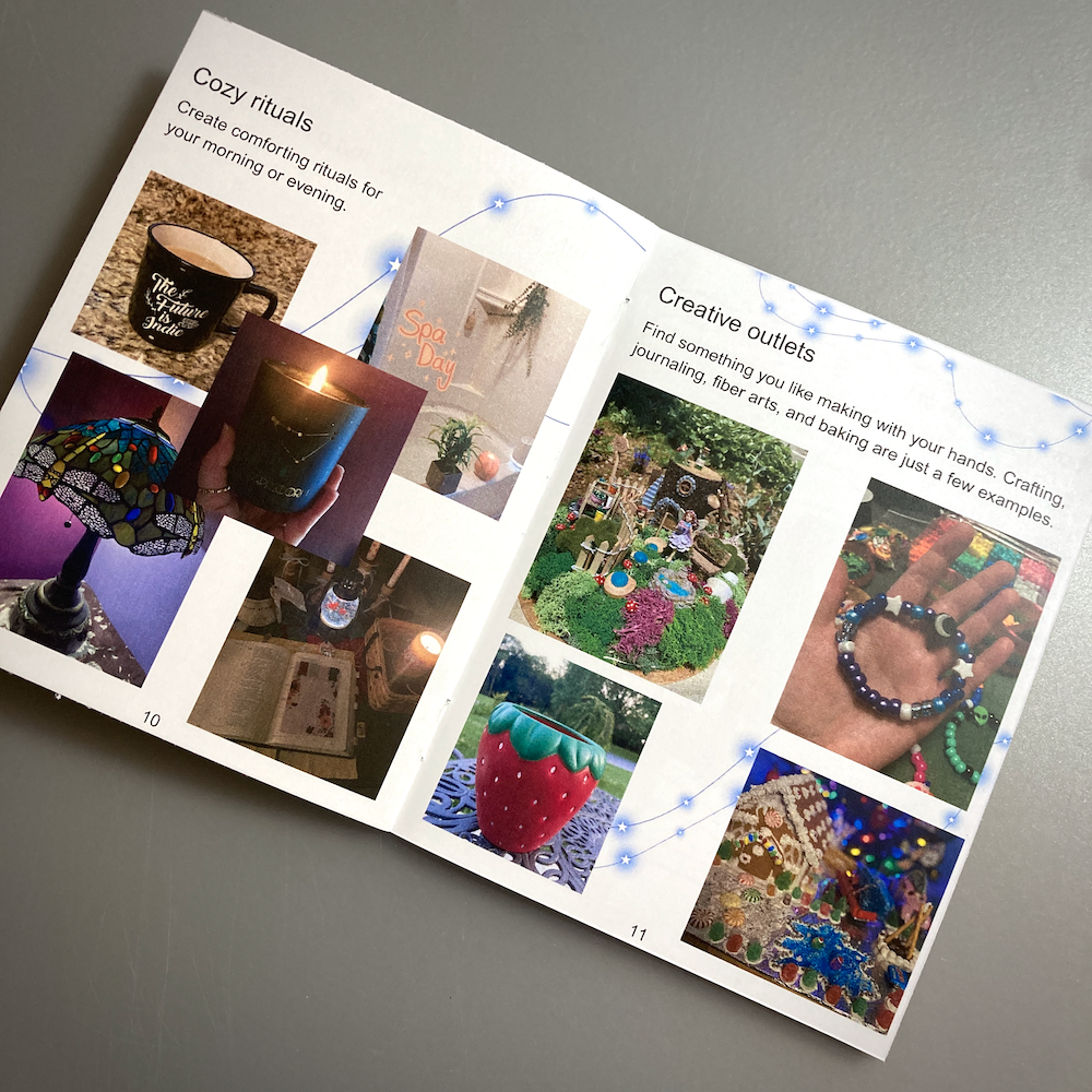 An open zine spread features cozy rituals with candles and drinks on the left page, and creative outlets like crafting and painting on the right page, adorned with decorative string lights.