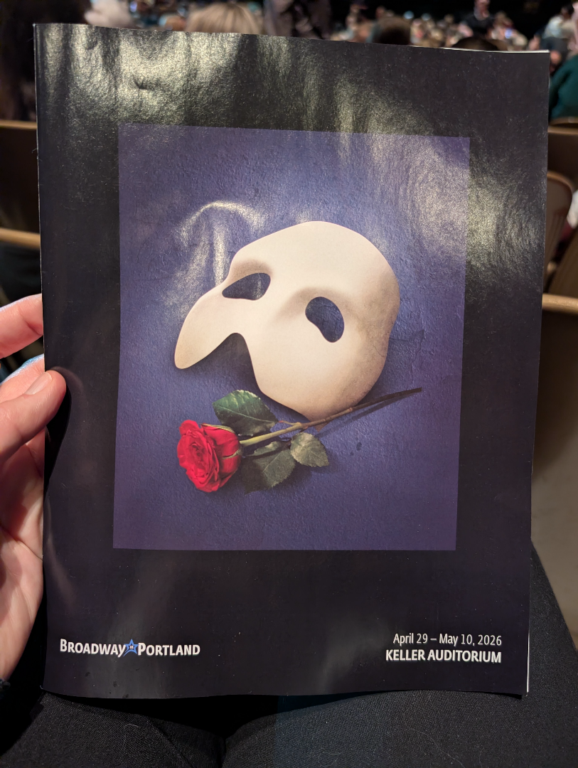 A playbill for The Phantom of the Opera features a white mask and a red rose, with performance dates and location at Keller Auditorium.