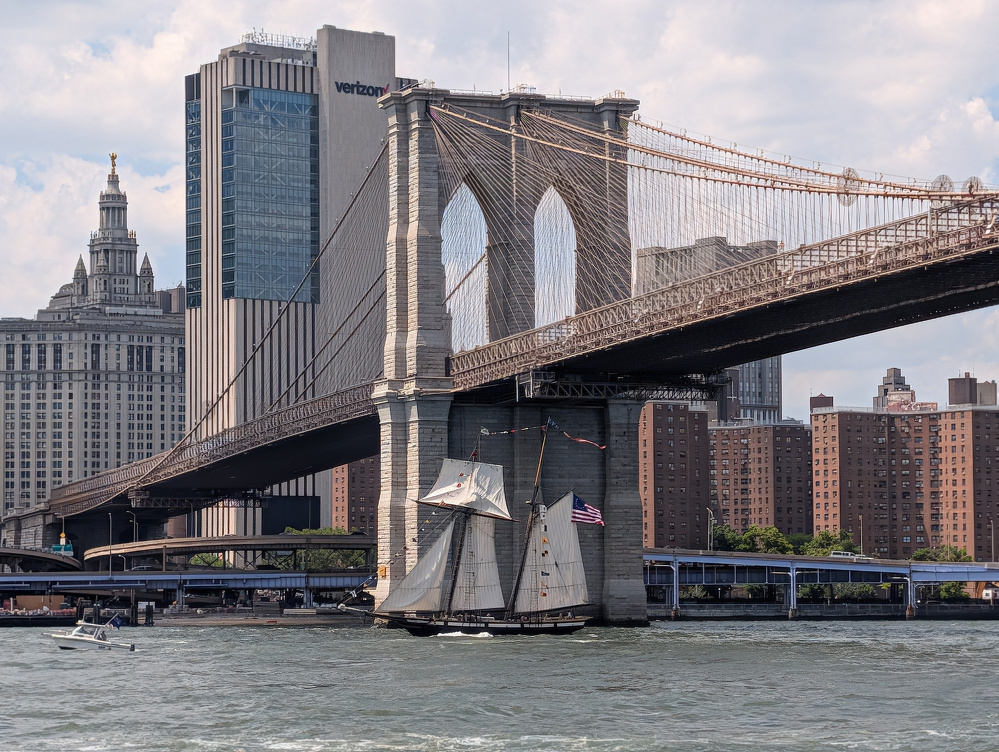 The tall ship Lynx passing under the Brooklyn Bridge on July 3, 2026.