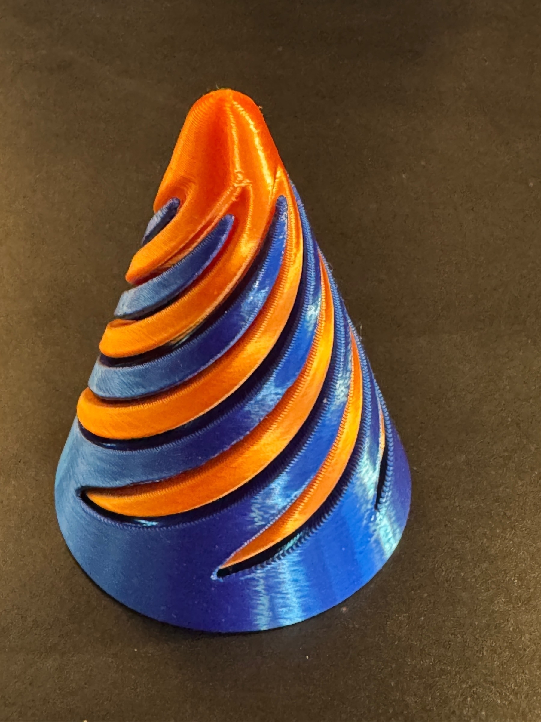 A cone shaped two tone fidget