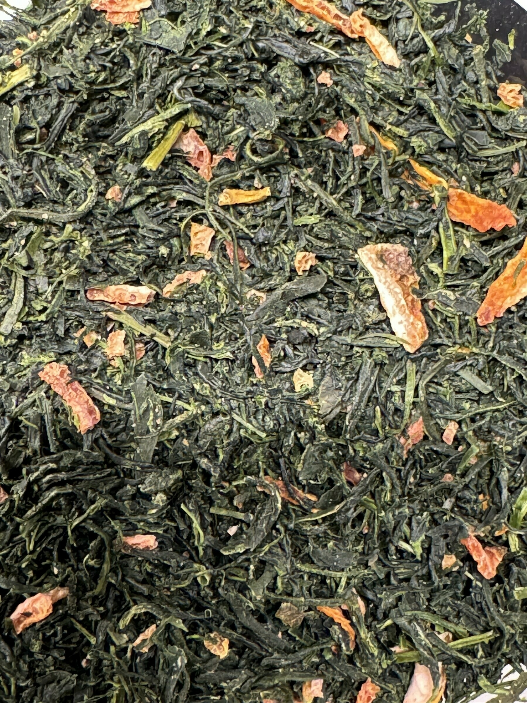 Darker green tea with yuzu peels in it