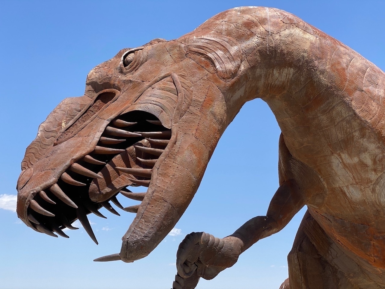 Dinosaur metal sculpture