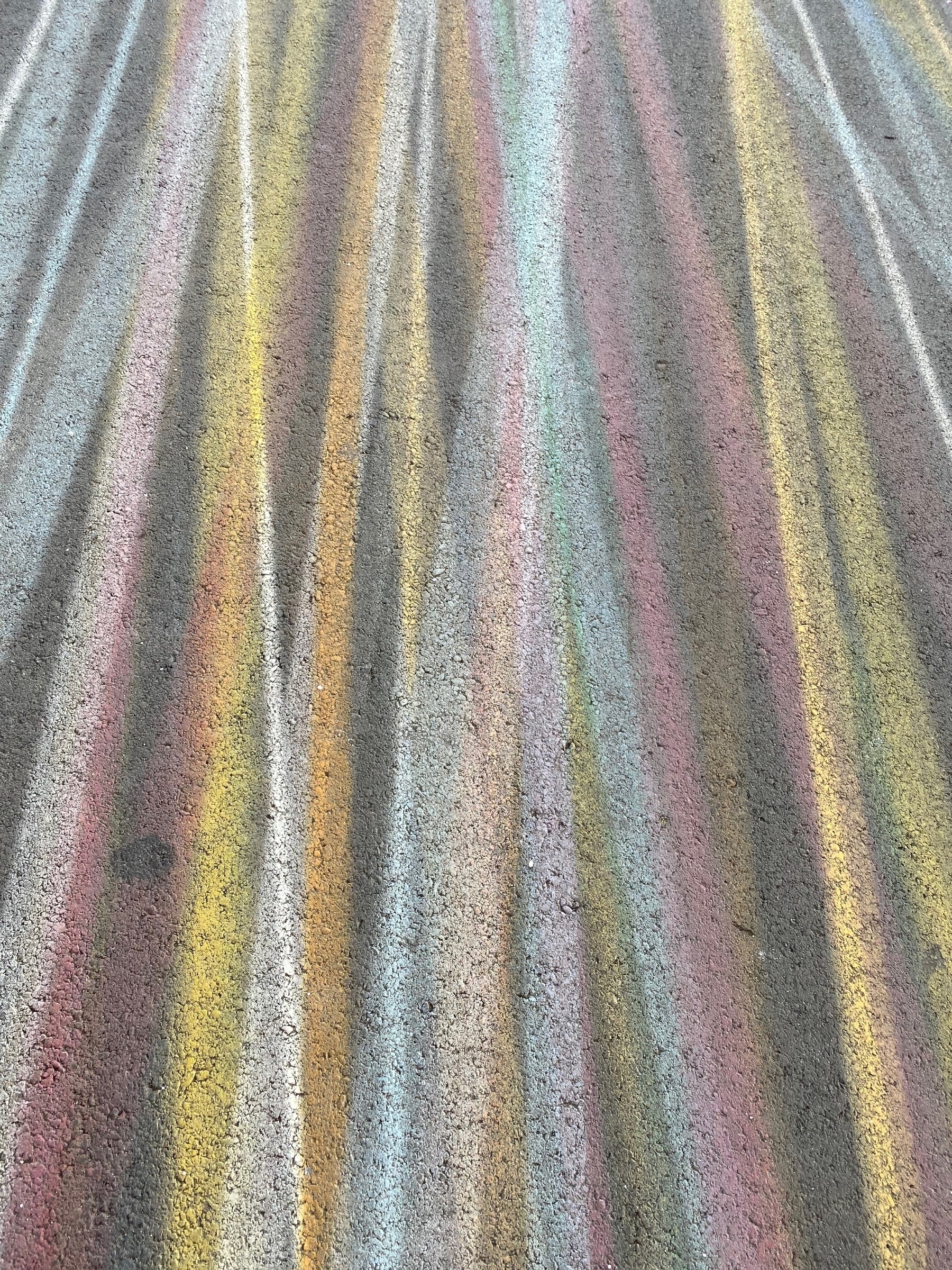 Chalk like pastel lines running from top to bottom.