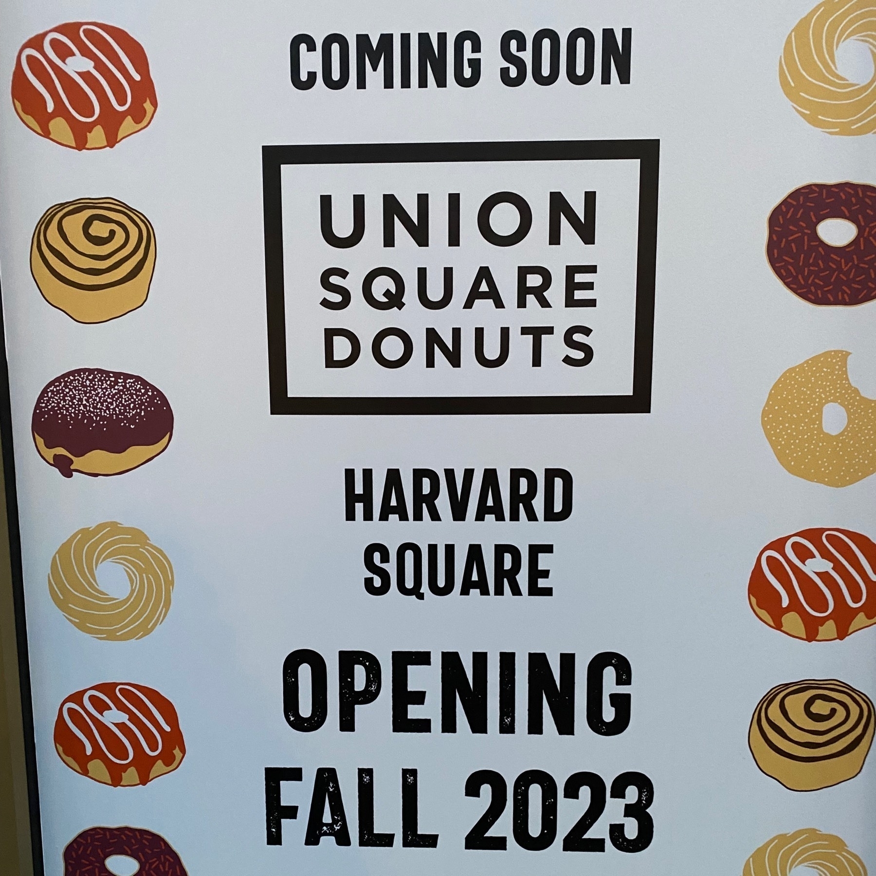 Sign reading: Coming Soon, Union Square Donuts, Harvard Square, Opening Fall 2023. 