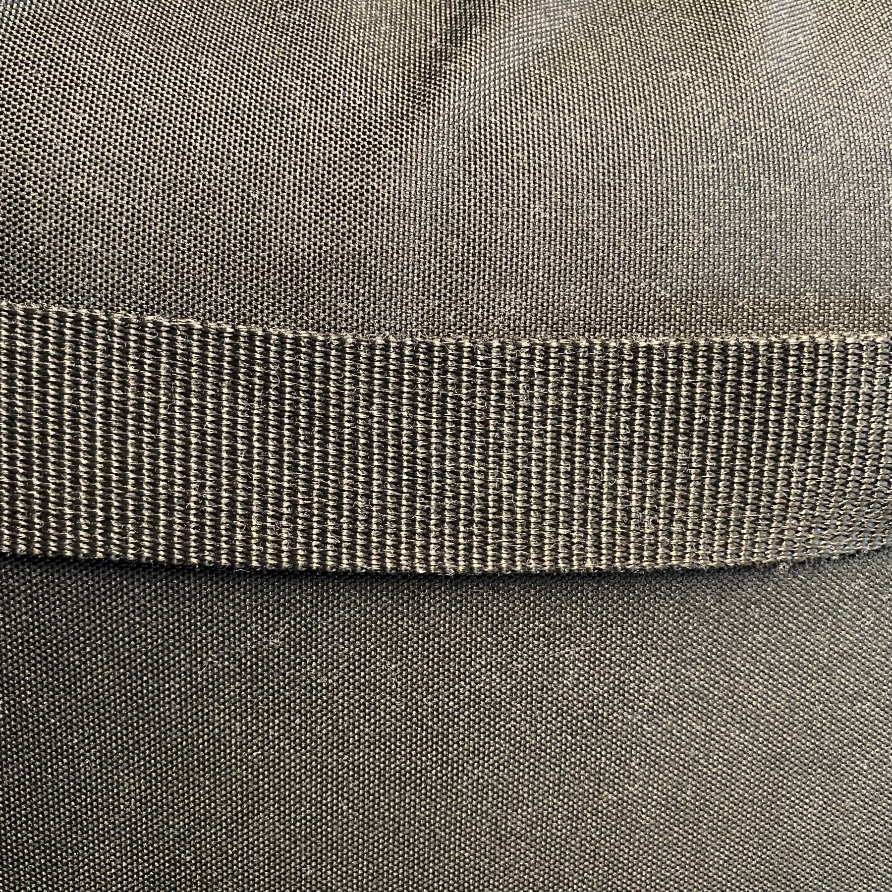 Close up of a cloth laptop bag.