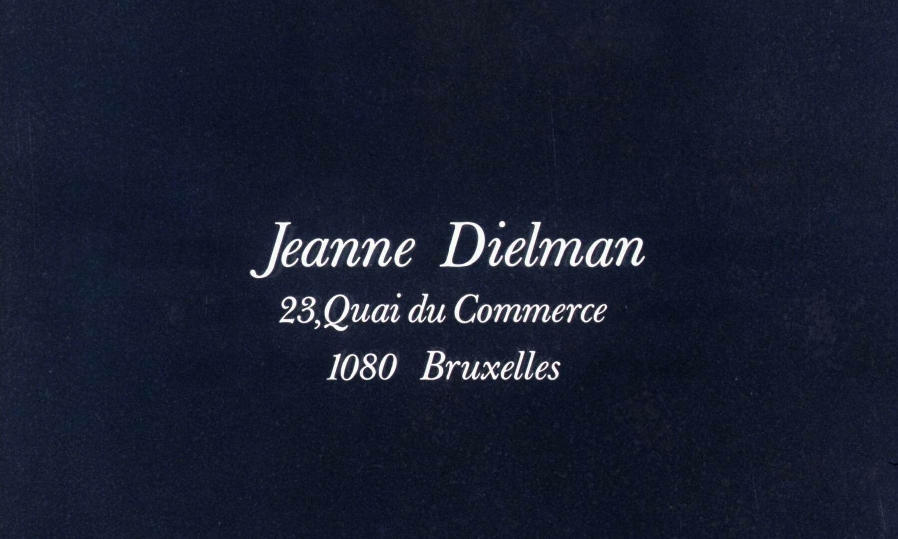 The title card for the film, Jeanne Dielman, 23, quai du Commerce, 1080 Brussels.
