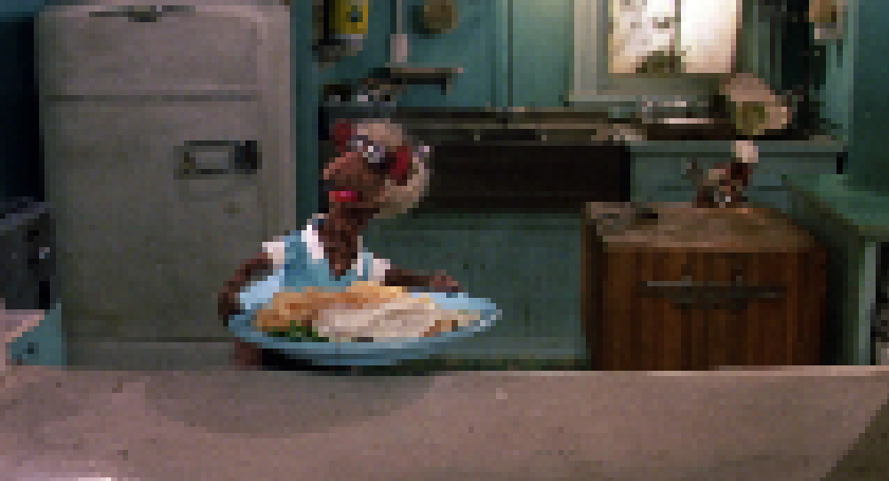 Yolanda Rat with her blonde ponytail, looking unimpressed at something off-camera