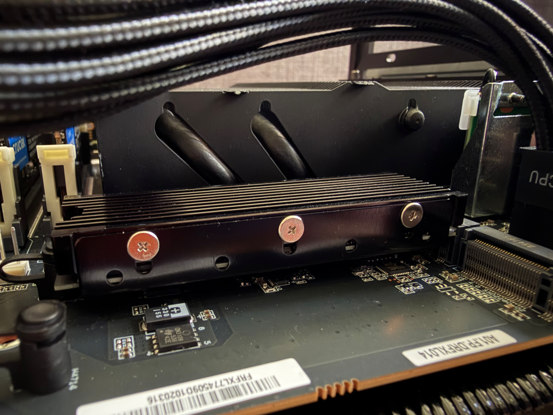 The MHQJRH M.2 2280 SSD heatsink looks nice and leverages the CPU cooler airflow