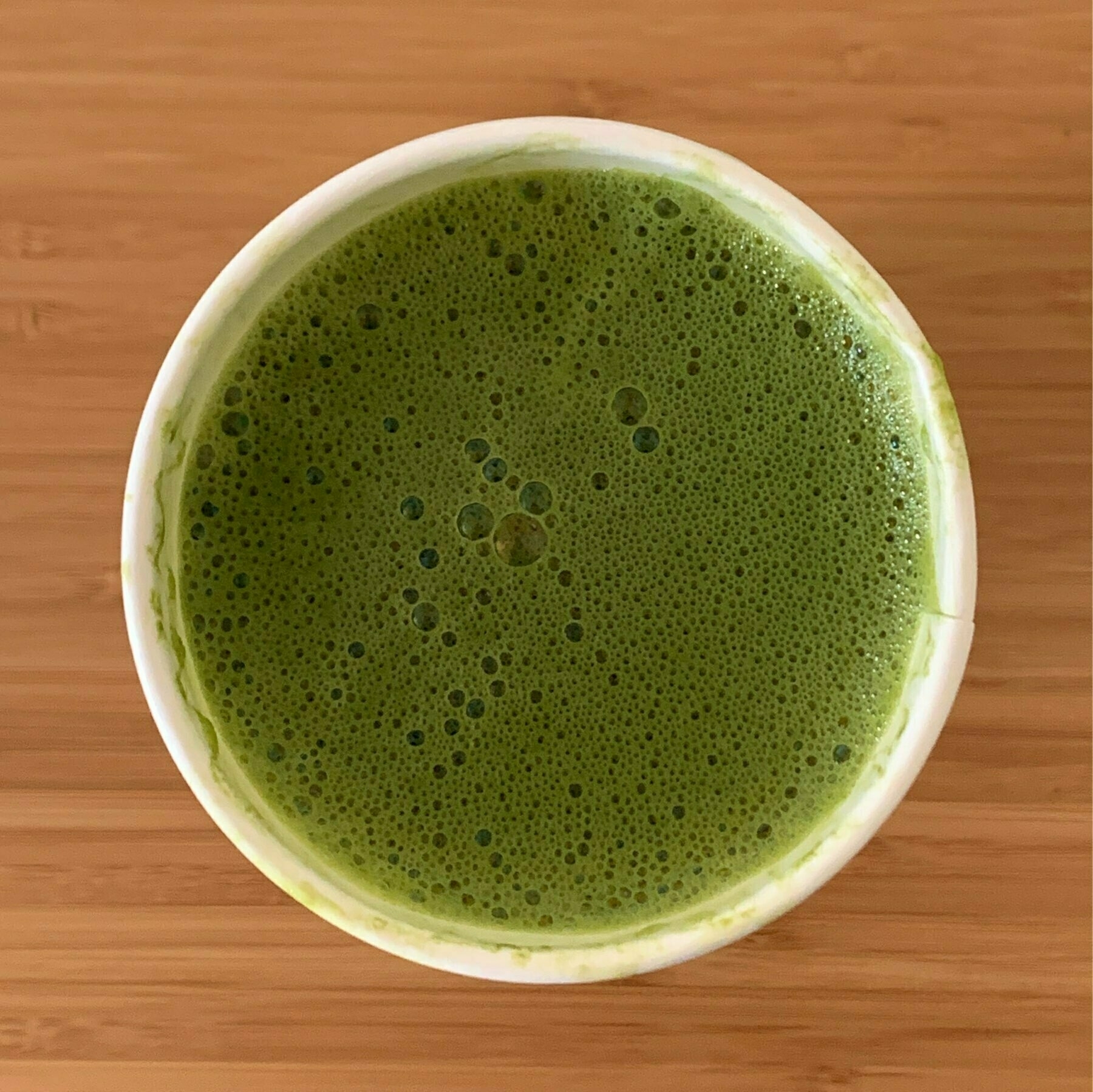 top down view of a cup of matcha tea