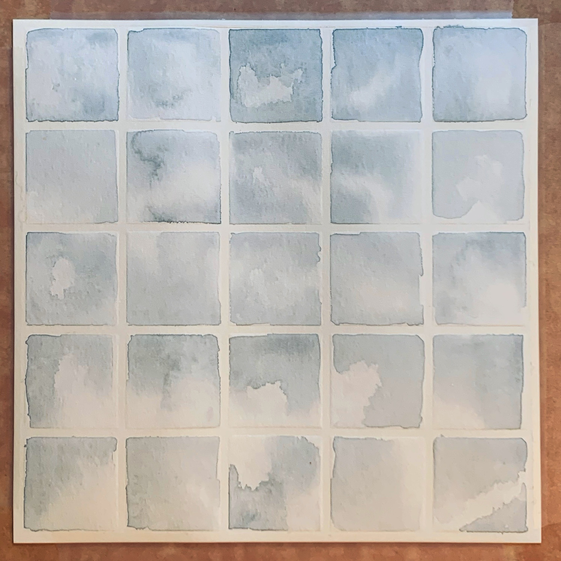 grid of blue grey water color squares 