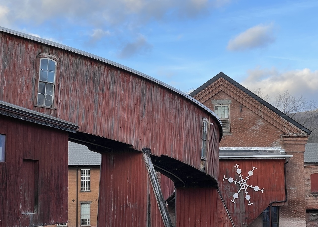 Curved-sky bridge at the Lamson and Goodnow mill in Shelburne Falls, Massachusetts, photo taken January 7, 2023, by David Leitko