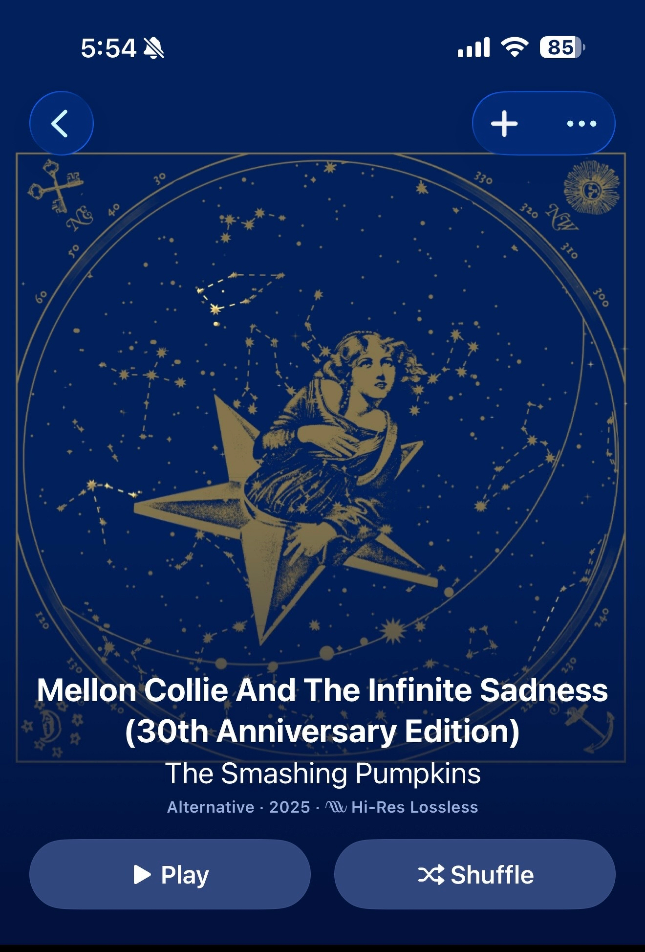 A celestial-themed artwork features a figure sitting on a star, surrounded by constellations, with text below about the Mellon Collie And The Infinite Sadness (30th Anniversary Edition) by The Smashing Pumpkins.