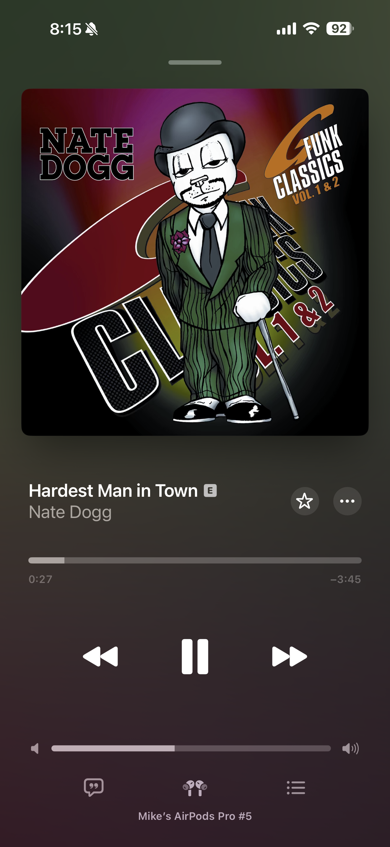 A digital music player displays the song Hardest Man in Town by Nate Dogg, featuring a cartoon-style character on the album cover for G Funk Classics Vol. 1 & 2.