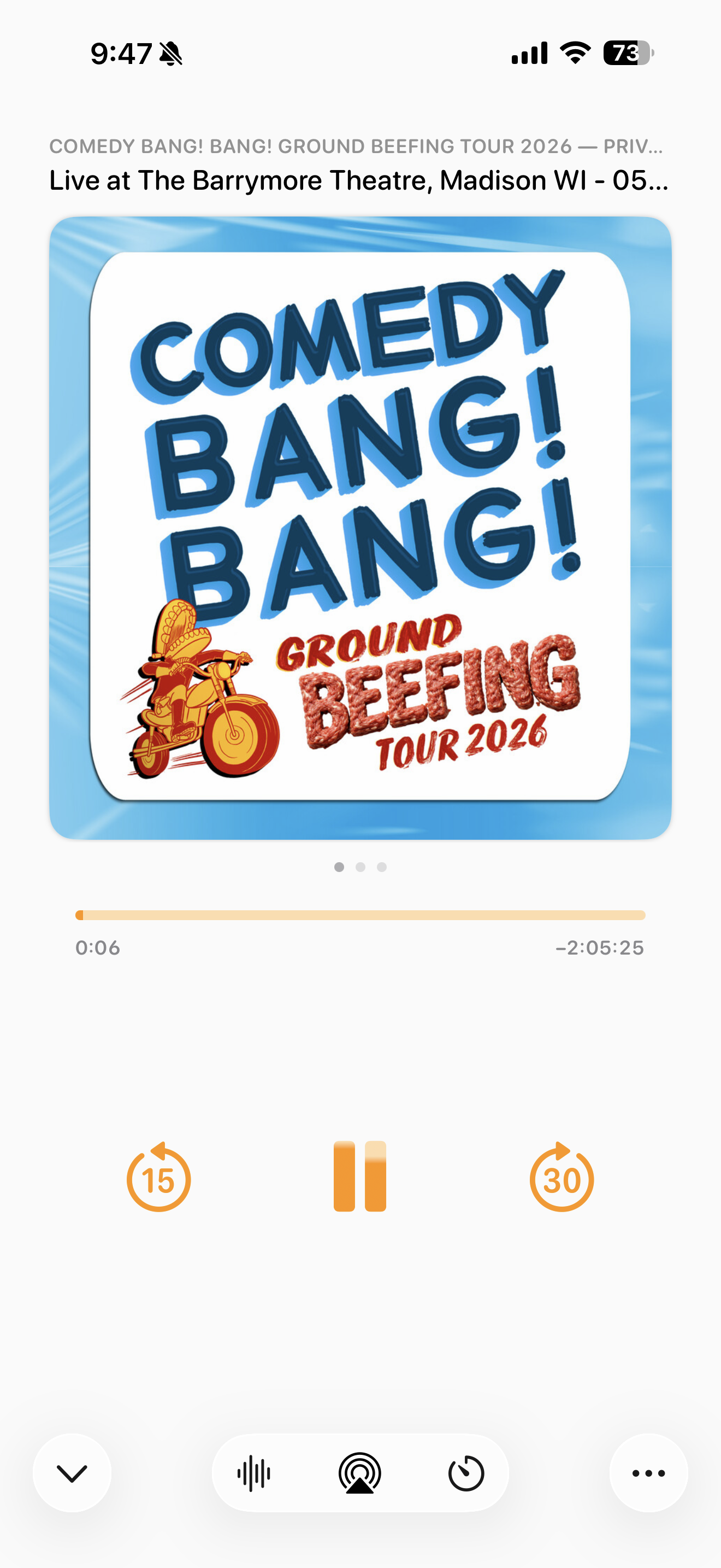 An audio playback screen is displayed with the title Comedy Bang! Bang! Ground Beefing Tour 2026 alongside a cartoon motorcycle logo.