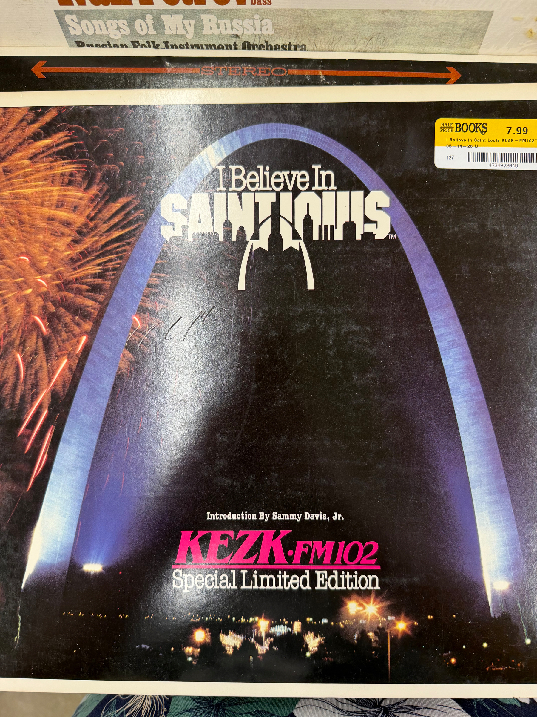 The cover features the iconic Gateway Arch illuminated at night with fireworks in the background and promotes a special limited edition from KEZK-FM 102 titled I Believe In Saint Louis.