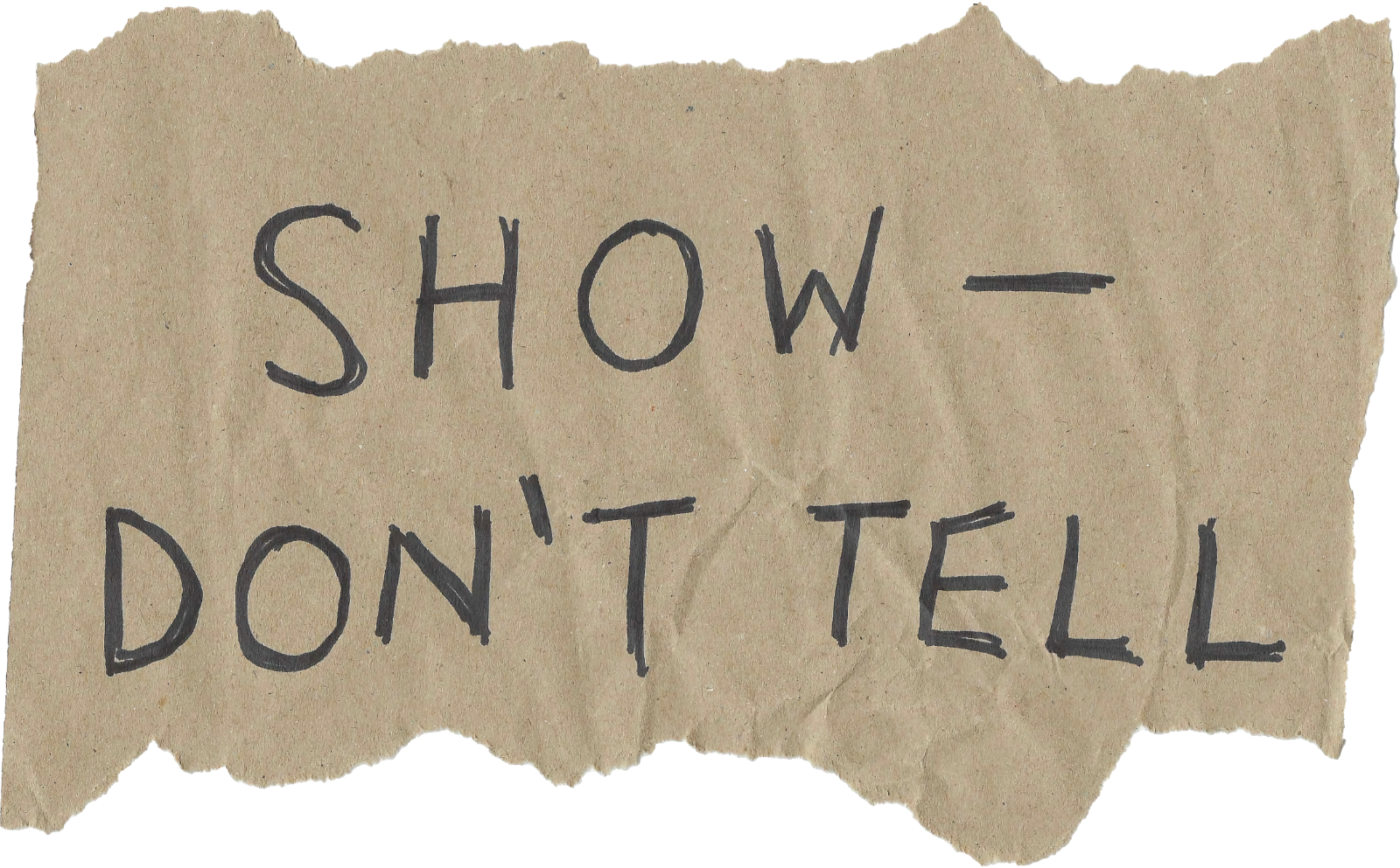 Auto-generated description: A piece of torn paper has the handwritten message SHOW - DON'T TELL. A message going forward - I'm in a screenwriter at heart.